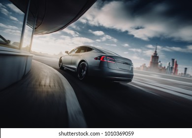 Moscow, Russia - January 10, 2018: Electric Car Tesla Model S P85 Fast Speed Drive On The Road At Sunset. Back View