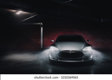 Moscow, Russia - January 10, 2018: Electric car Tesla Model S P85 wrapped in grey color matte vinyl at underground parking