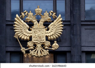 Moscow, Russia - January 2020: Coat of arms of Russia closeup, national emblem on the building of Russian Parliament. Double headed eagle on State Duma facade, concept of government and authorities