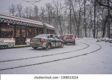 MOSCOW, RUSSIA - JANUARY 26,2019: Due To The Large Amount Of Snow That Fell, Traffic Is Partly Obstructed. Rainfall Again Beats Historical Records.