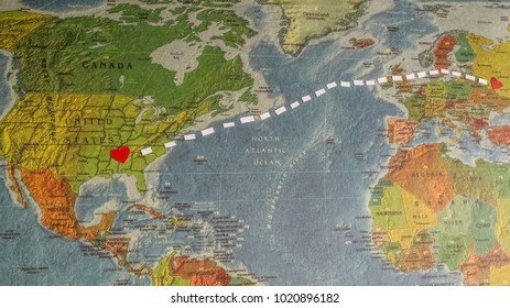 MOSCOW, RUSSIA. January 27, 2018. Hearts connected with white line on world map. Long distance relationship concept. - Shutterstock ID 1020896182