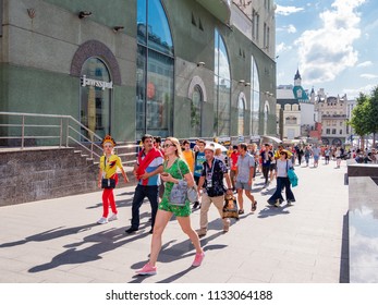 MOSCOW, RUSSIA - July 01, 2018. Tourists And Local Football Fans Walking On Nikolskaya Street Before Game Russia-Spain (FIFA World Cup 2018).