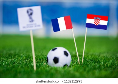 MOSCOW, RUSSIA - JULY, 1, 2018: France - Croatia, FINAL OF FIFA World Cup, Russia 2018, National Flags On Green Grass, White Football Ball On Ground.