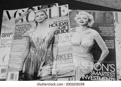 Moscow, Russia - July 1, 2021: Vintage Vogue Magazines; Vogue Is American Fashion And Lifestyle Magazine That Covers Fashion, Beauty, Culture, Living, Runway; Charlize Theron, Michelle Williams Cover