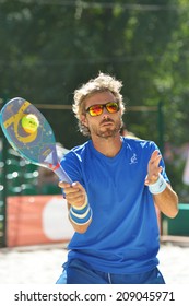 MOSCOW, RUSSIA - JULY 20, 2014: Alessandro Calbucci of Italy in the final match against Brazil during ITF Beach Tennis World Team Championship. Italy won 2-0