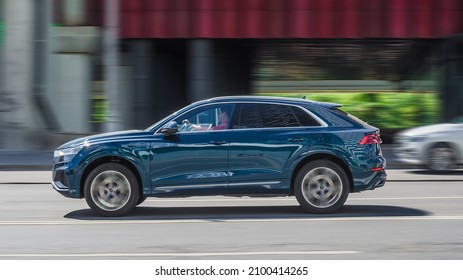 Moscow, Russia - July 2021: Audi Q8 Car Driving On City Road With Motion Blur, View From The Side