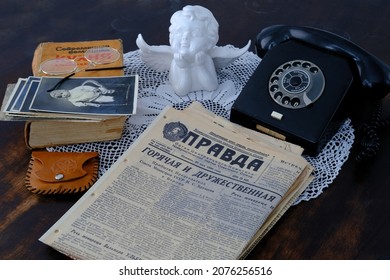 Moscow, Russia - July 2021: Old USSR Newspaper Pravda 1960, Photos 50s, 60s, Retro Phone, Kitchen Book, Handmade Lacy On Table, Concept Of Genealogy, Memory Of Past Time, Family Archive