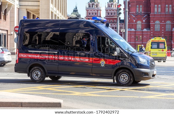 MOSCOW, RUSSIA - JULY 23, 2020: Police car of\
the Investigative Committee of Russia in front of the Kremlin\
towers of Red Square in the center of Moscow. Excellent Crime\
Illustrative Editorial