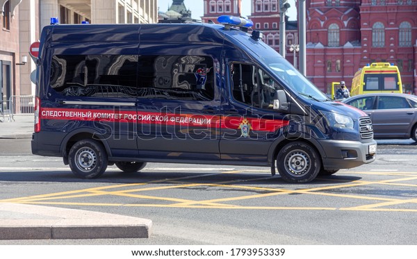 MOSCOW, RUSSIA - JULY 23, 2020: Police car of\
the Investigative Committee of Russia in front of the Kremlin\
towers of Red Square in the center of Moscow. Excellent Crime\
Illustrative Editorial