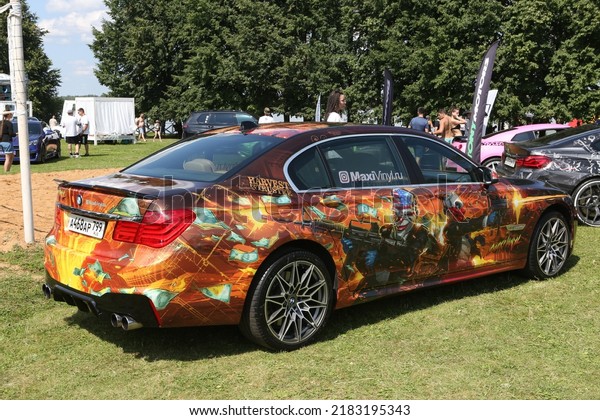 MOSCOW, RUSSIA - JULY 23, 2021: Car. Automobile on
street of Moscow city, Russia. Unusual tuning car. Custom car,
customized cars. Tuning auto, cars at Tuning Open Fest in Moscow.
Custom paint cars