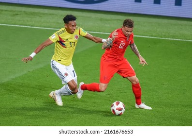 Moscow, Russia – July 3, 2018. England national football team right-back Kieran Trippier and Colombia winger Johan Mojica during World Cup 2018 Round of 16 match Colombia vs England.
