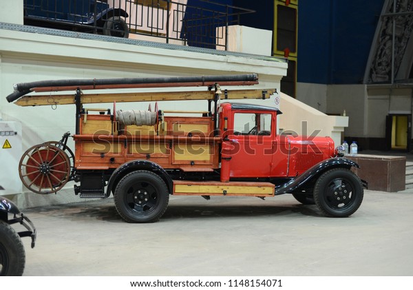 MOSCOW, RUSSIA - JULY 31,\
2014: PMG-1 made in USSR 1930s fire engine based on GAZ-AA track -\
licensed american Ford Model AA. Soviet Russian old cars exhibition\
on VDHKh.