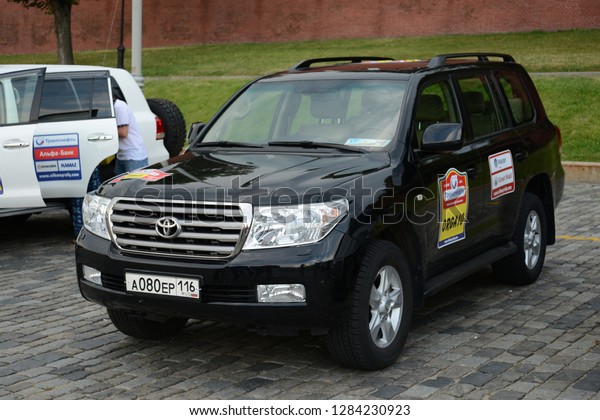 MOSCOW, RUSSIA -\
JULY 5, 2013: Silk Way rally raid Toyota Land Cruiser 200 car\
before start at the Moscow Red Square. Silk Way Rally is an annual\
rally raid type of off-road\
race.