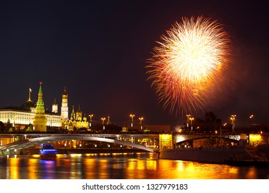 Moscow, Russia - Jun 12, 2010: Festive fireworks at the Moskva River embankmen near the Kremlin.
