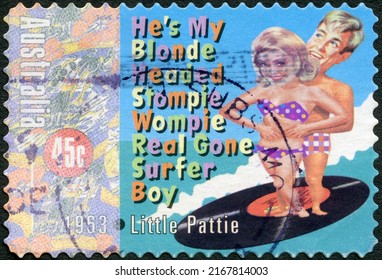 MOSCOW, RUSSIA - JUNE 04, 2022: A stamp printed in Australia shows Hes my blonde headed stompie wompie, Little pattie, Rock and Roll in Australia, 1998