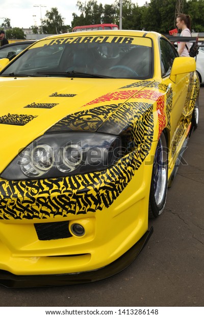 MOSCOW, RUSSIA - JUNE 1, 2019: Open automobile
festival of Stance culture in Podsolnukhi Art&Food center,
Moscow city, Russia. Tuning yellow car. Art car by Pokras Lampas.
Customized Toyota Supra
car