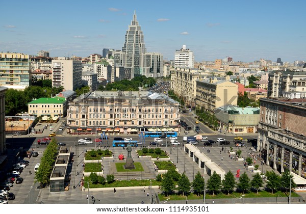 Moscow, Russia - June 15, 2018. View\
over Triumfalnaya square in Moscow, with historic and modern\
buildings, commercial properties, city traffic and\
people.