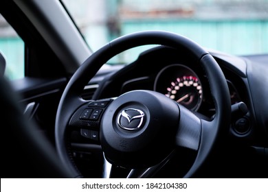 Moscow, Russia - June 18, 2014: Mazda 3 Skyactiv Steering Wheel In Interior With Dashboard Shot Behind The Seat