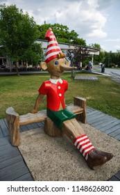 MOSCOW, RUSSIA - June 19, 2018: Wooden Sculpture Of Buratino (Russian Pinocchio)in The Park