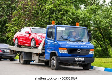 MOSCOW, RUSSIA - JUNE 2, 2012: Blue tow truck Mercedes-Benz Vario 614D at the city street.