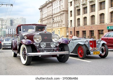 MOSCOW, RUSSIA - JUNE 2, 2013: Retro Cars Cadillac V16 And MG TA Compete At The Annual L.U.C. Chopard Classic Weekend Rally.