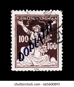 MOSCOW, RUSSIA - JUNE 20, 2017: A Stamp Printed In Czechoslovakia Shows Woman Breaking Chains To Freedom, Circa 1920