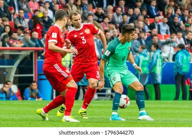 Moscow, Russia – June 21, 2017. Russia Players Viktor Vasin And Roman Shishkin Against Portugal Striker Andre Silva During FIFA Confederations Cup 2017 Match Russia Vs Portugal.