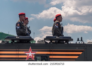 MOSCOW, RUSSIA - JUNE 24, 2020: Soldiers Ride Armored Military Vehicles At The Victory Day Parade