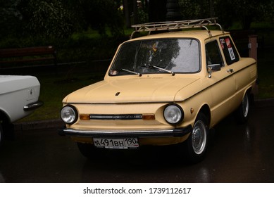 MOSCOW, RUSSIA - JUNE 28, 2015: ZAZ-968M 'Zaporozhetc' Old Classic Soviet Russian Made In USSR 1980s Car On The Rainy Street