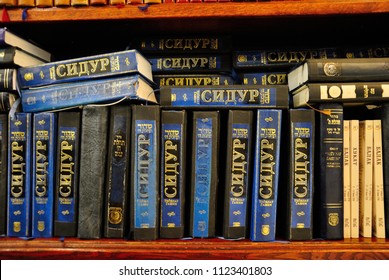 Moscow, Russia - June 28, 2018 - A shelf of Siddur (Jewish prayer book) in Russian