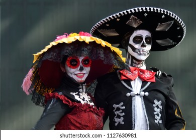 Moscow, Russia - June 29, 2018: Participants in traditional clothing during Dia de los Muertos Mexican carnival. Sugar skull makeup. Day of The Dead