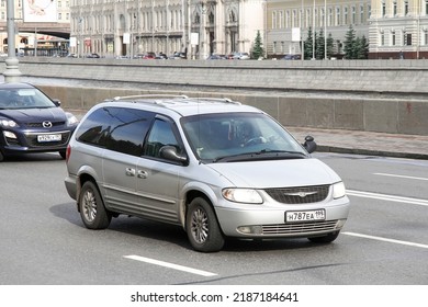 Moscow, Russia - June 3, 2012: Grey Minivan Chrysler Town And Country In The City Street.