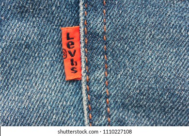 MOSCOW, RUSSIA - JUNE 9, 2018: Levi's Denim Jeans Brand Labels. Levi Strauss Is An American Clothing Company, Based In California, Selling Classic Vintage Denim Jeans. Levis Tag On Denim Jean Texture.