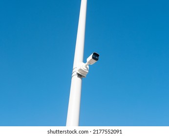 Moscow, Russia - March 01, 2022: CCTV Camera Mounted On A Pole For Street Security. Angle View.