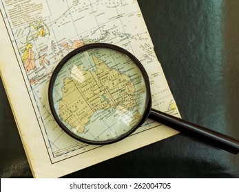 Moscow, Russia - March 11, 2015: Old Russian Map Of Australia Under The Magnifying Glass.  