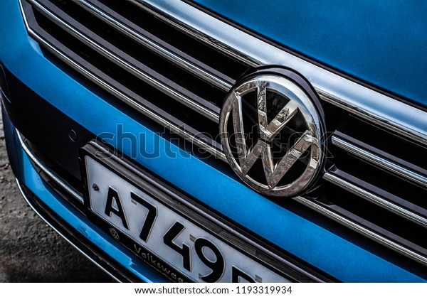 MOSCOW, RUSSIA - MARCH 11, 2018 VOLKSWAGEN PASSAT\
Variant Wagon front side view. Family wagon car. Volkswagen close\
up logo on car dashboard. Volkswagen car logo bage. VW plate logo.\
Blue car.