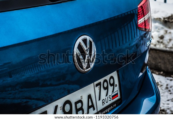 MOSCOW, RUSSIA - MARCH 11, 2018 VOLKSWAGEN PASSAT\
Variant Wagon front side view. Family wagon car. Volkswagen close\
up logo on car dashboard. Volkswagen car logo bage. VW plate logo.\
Blue car.