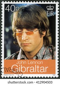 MOSCOW, RUSSIA - MARCH 12, 2016: A Stamp Printed In Gibraltar Shows John Winston Ono Lennon (1940-1980), Singer And Songwriter, 1999