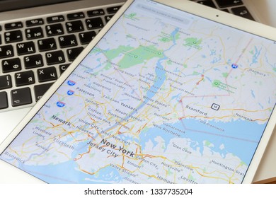 Moscow / Russia - March 13, 2019: The White IPad Lies On The MacBook Keyboard. On The Screen Is A Map Of The City Of New York