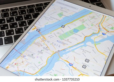 Moscow / Russia - March 13, 2019: The White IPad Lies On The MacBook Keyboard. On The Screen Is A Map Of The City Of New York