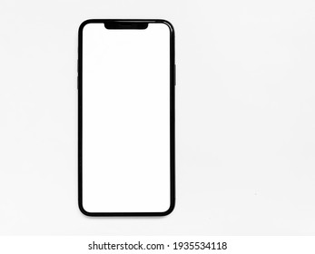 Moscow Russia March 14, 2021 .iPhone11 Pro Max, Modern Mobile Phone With Blank White Screen Isolated On White Background.  Top View, Close-up, Flat Lay, Copy Space.