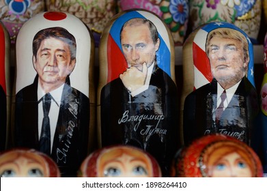 MOSCOW, RUSSIA - MARCH 16, 2019: Matryoshka dolls with the image of Japanese Prime Minister Shinzo Abe, Russian President Vladimir Putin and the 45th US President Donald Trump on the souvenir counter 