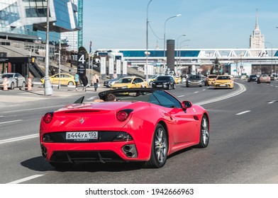 Moscow, Russia - March 2021: Rear View Of Red Ferrari California In The City Street. Rental Supercar. Rich People's Millionaire Lifestyle