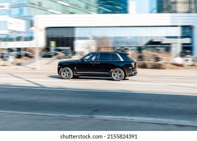 Moscow, Russia - March 2022: Rolls-Royce Cullinan Car Moving On The Street. Compliance With Speed Limits On Road Concept. Dynamic Exterior Image