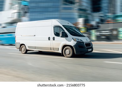 Moscow, Russia - March 2022: White Peugeot Boxer Panel Van In Fast Motion On City Street. Fast Moving Cargo Car On Urban Road