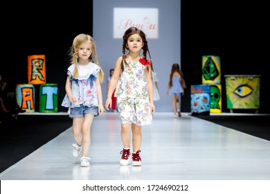 MOSCOW, RUSSIA - MARCH 21, 2019: Model walk runway for WINNY catwalk at Fall-Winter 2019-2020 at Moscow Fashion Week. Kid's fashion.