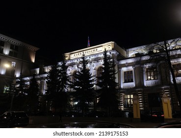 Moscow. Russia - March The 21th 2022: Night View Of Building Of Central Bank Of Russia In Moscow With Illumination With State Flag On The Top Of The Roof