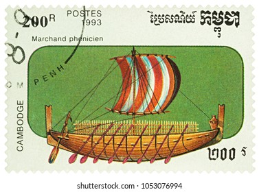 Moscow, Russia - March 24, 2018: A Stamp Printed In Cambodia Shows Ancient Phoenician Sailing Boat, Series 