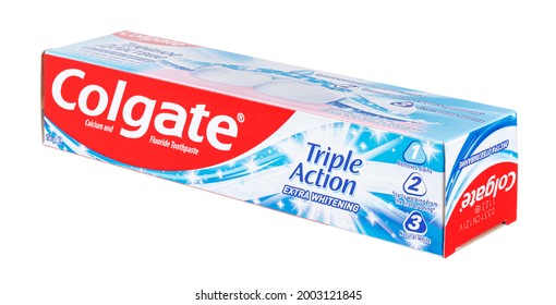 colgate triple action extra white