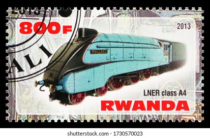 MOSCOW, RUSSIA - MARCH 28, 2020: Postage Stamp Printed In Rwanda Shows LNER Class A4, Steam Locomotives Serie, Circa 2013